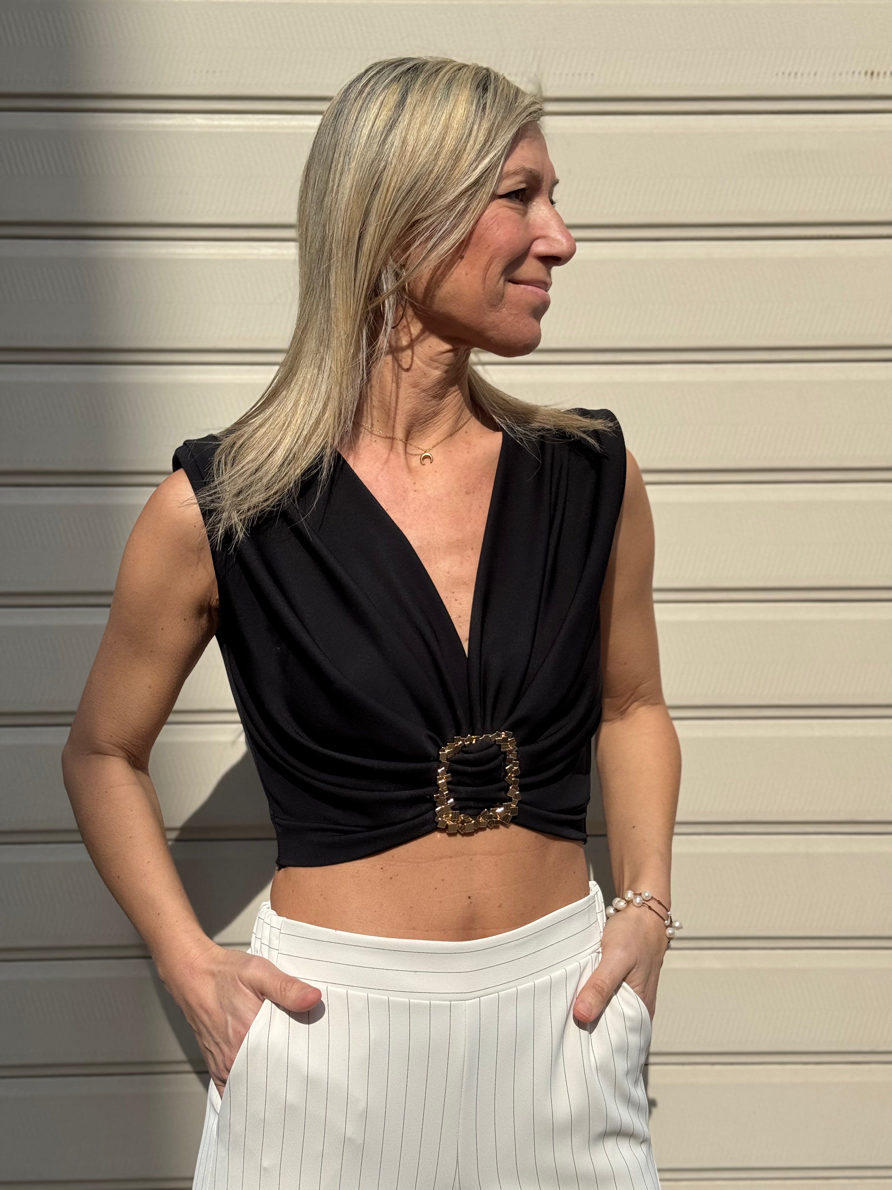 Top accessorio artigli