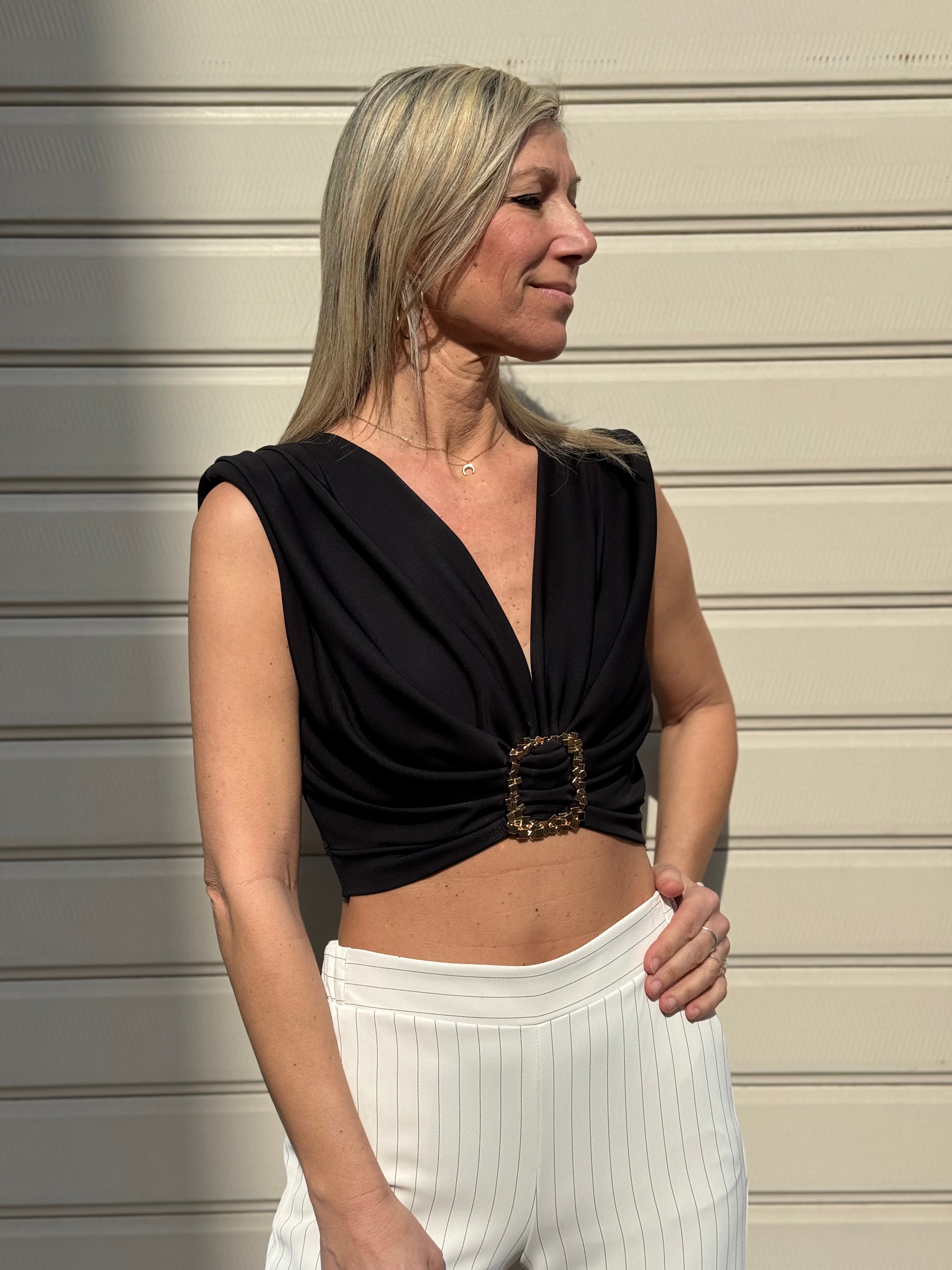 Top accessorio artigli