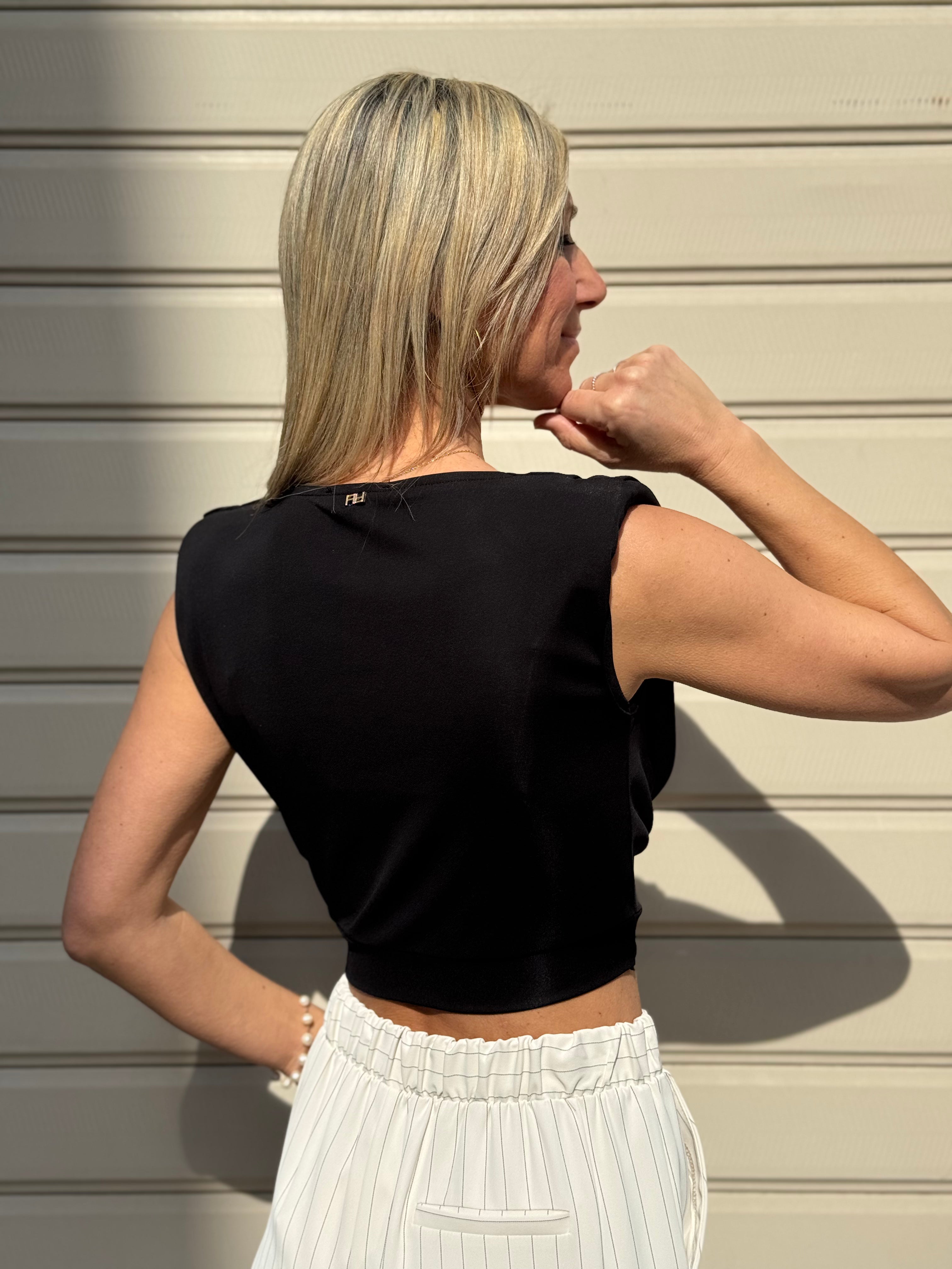 Top accessorio artigli