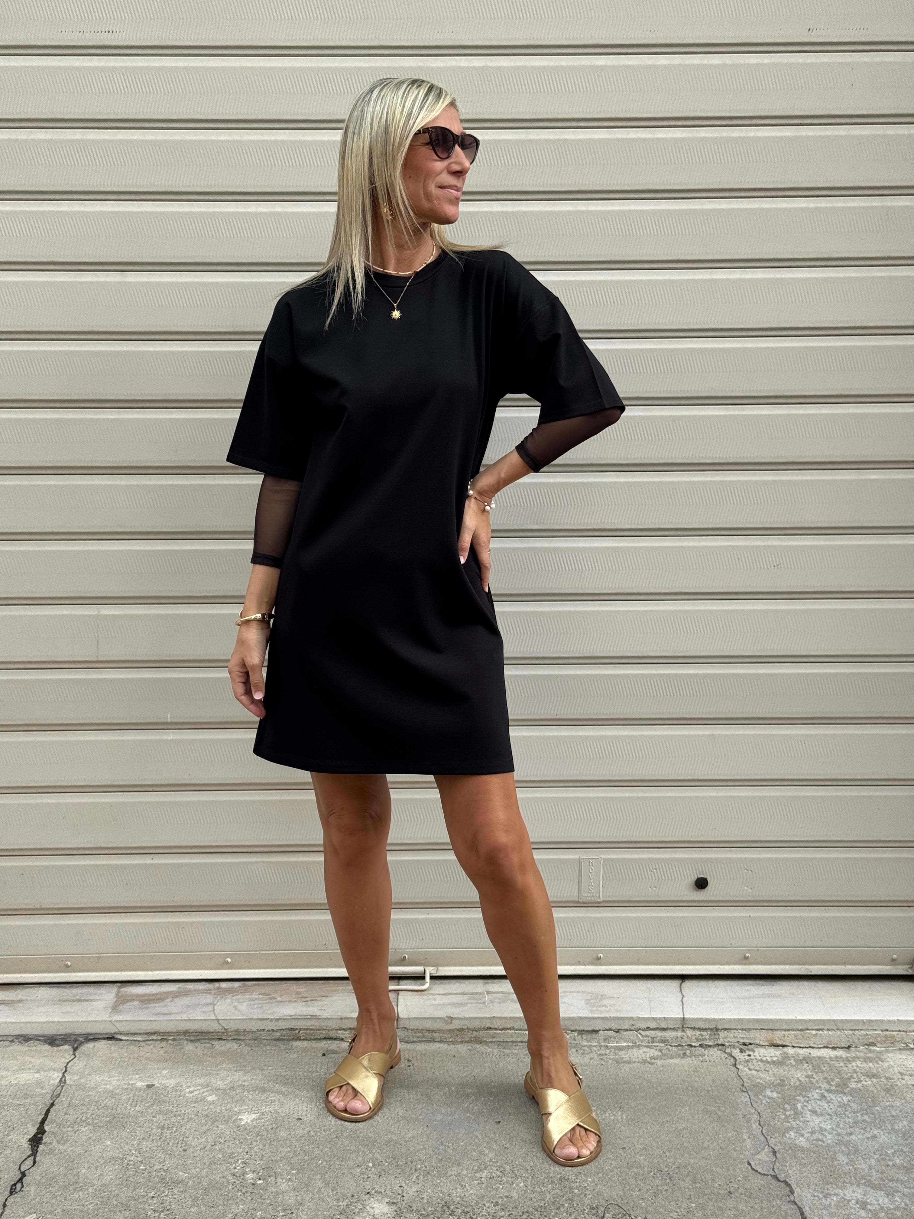 Abito manica tulle nero