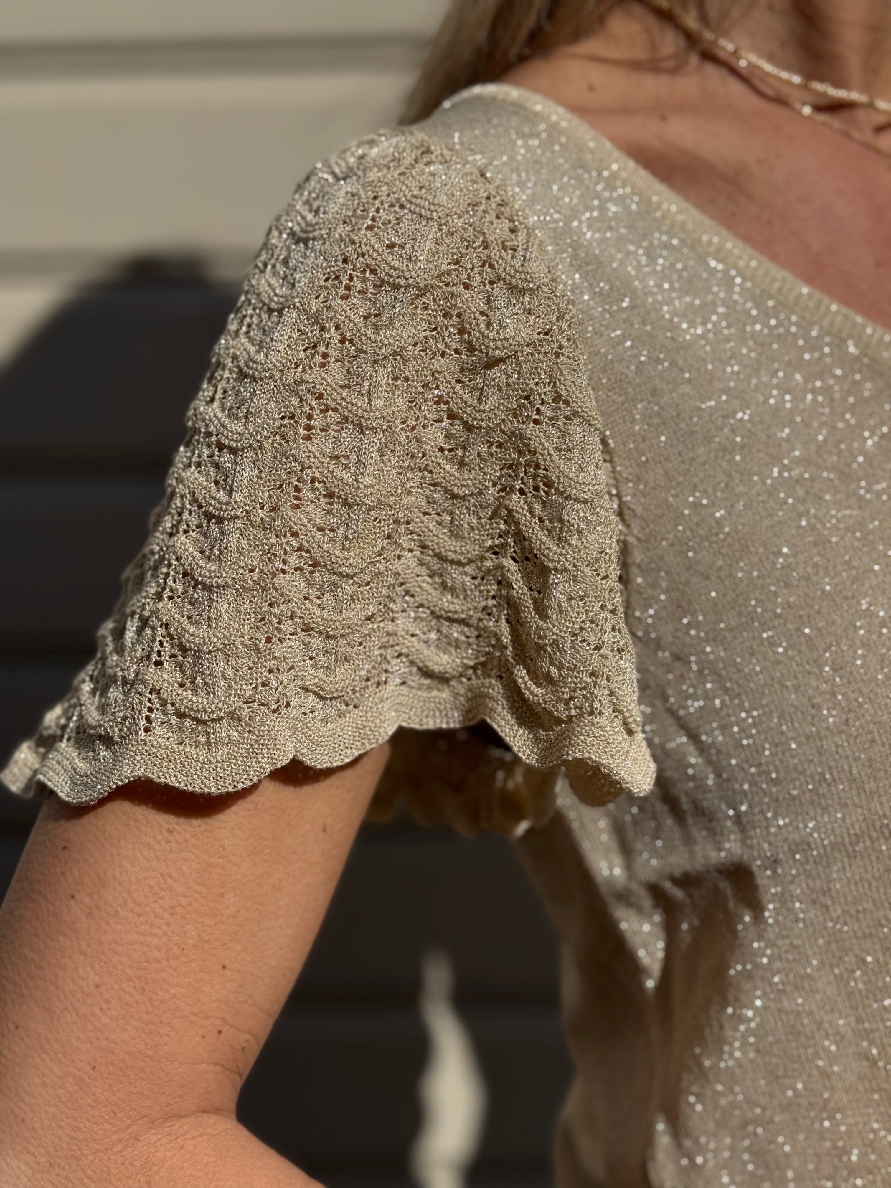 Maglia manica farfalla artigli