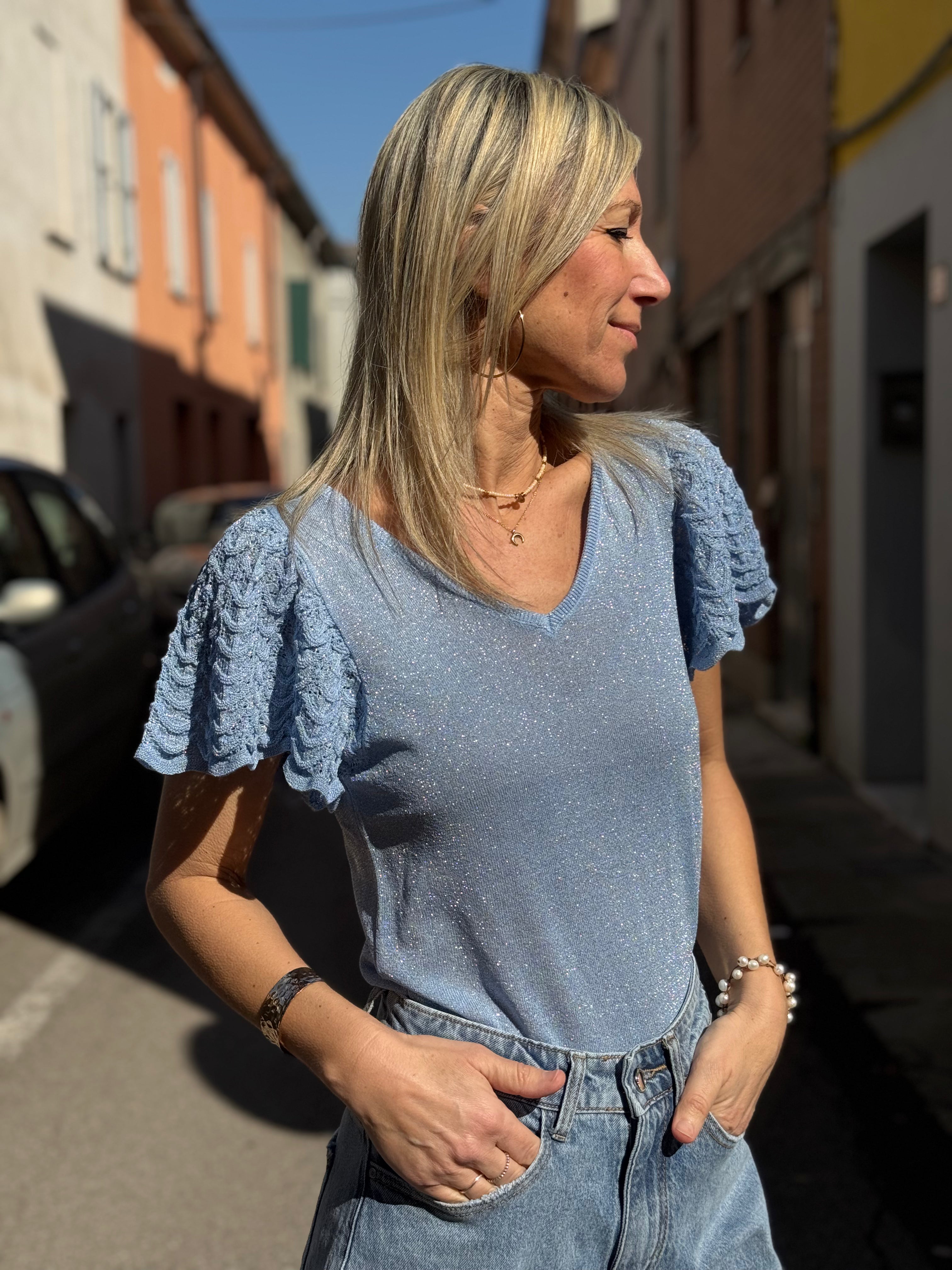 Maglia manica farfalla artigli