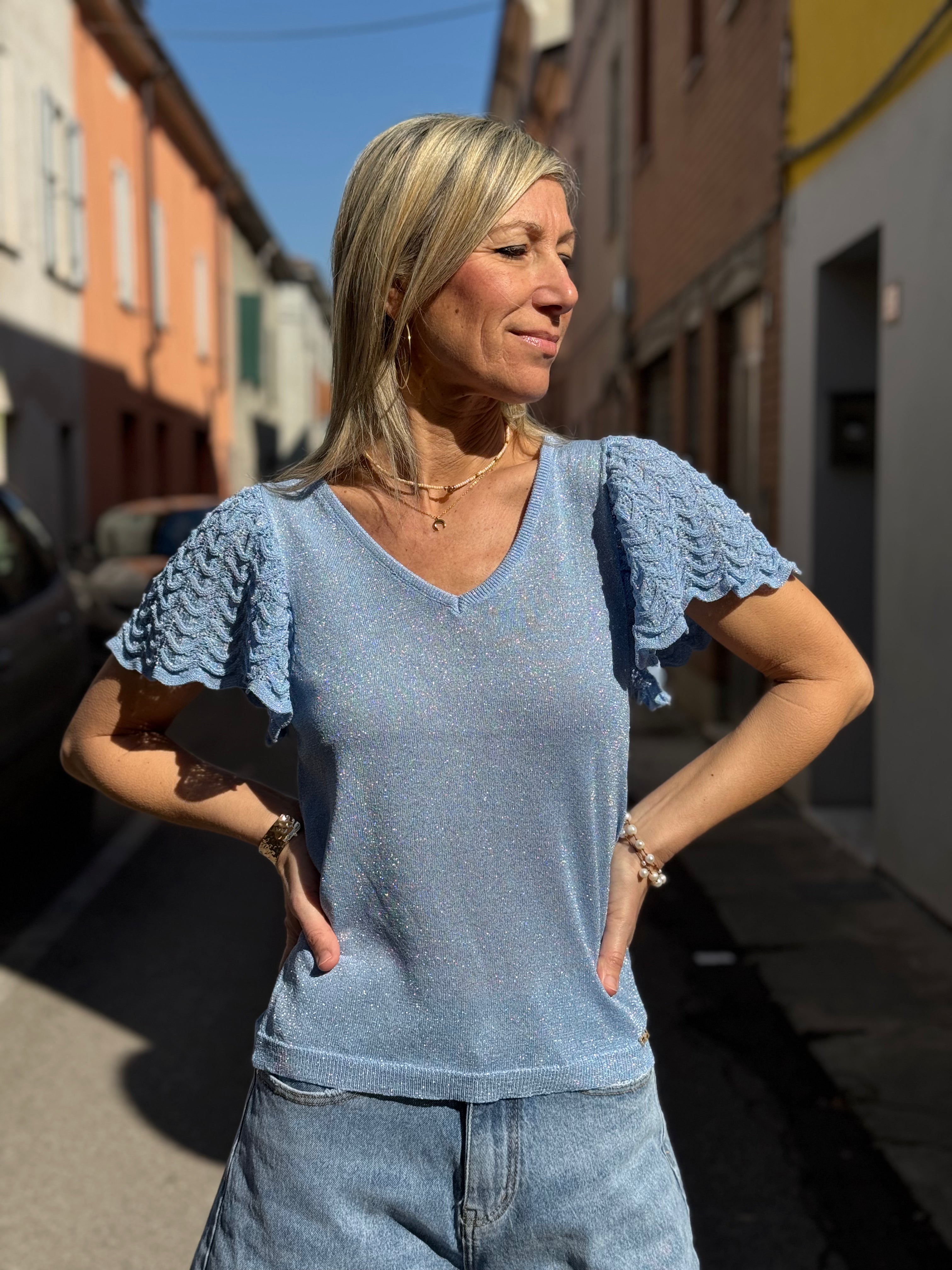 Maglia manica farfalla artigli