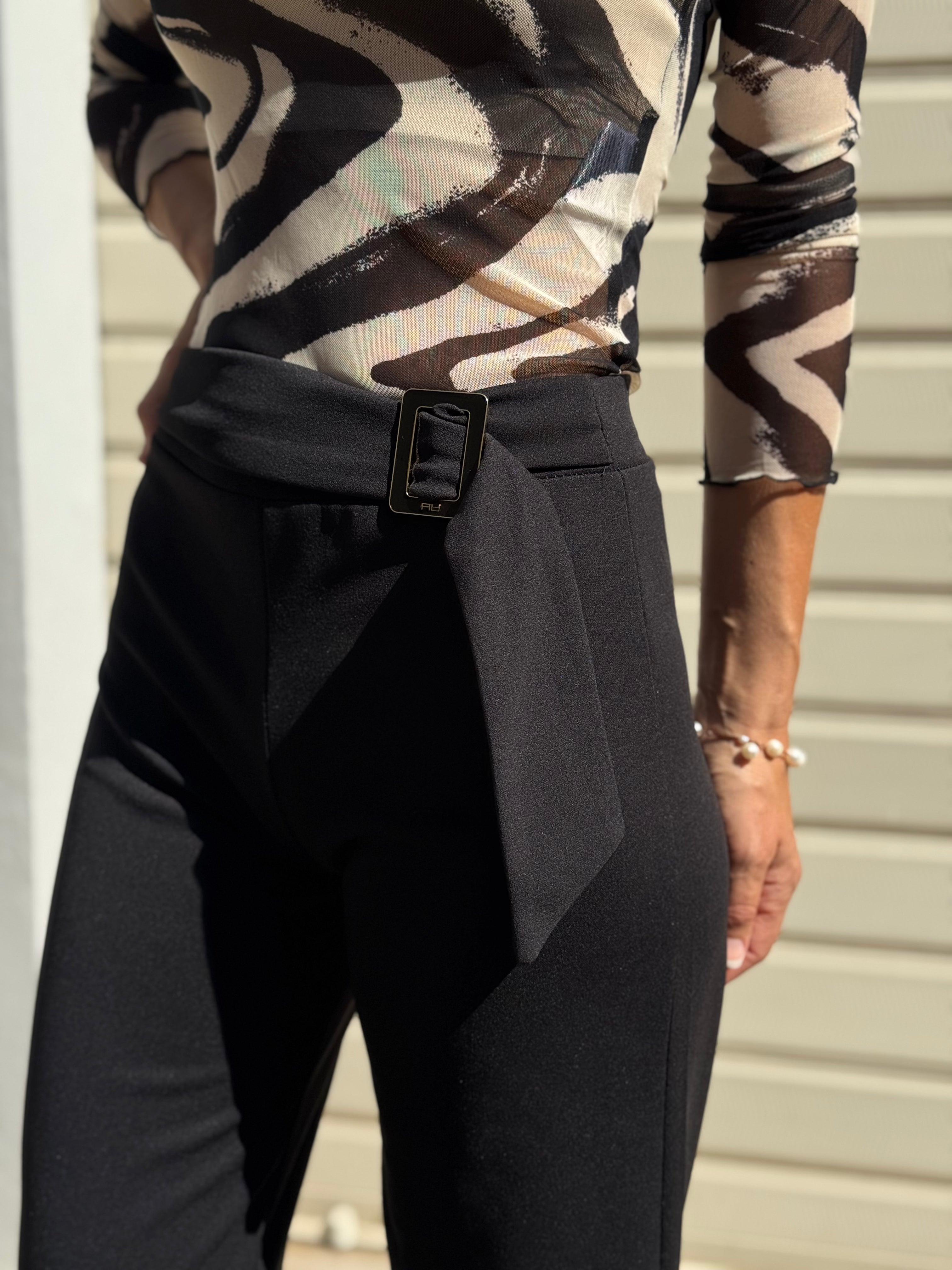 Pantalone fibbia artigli