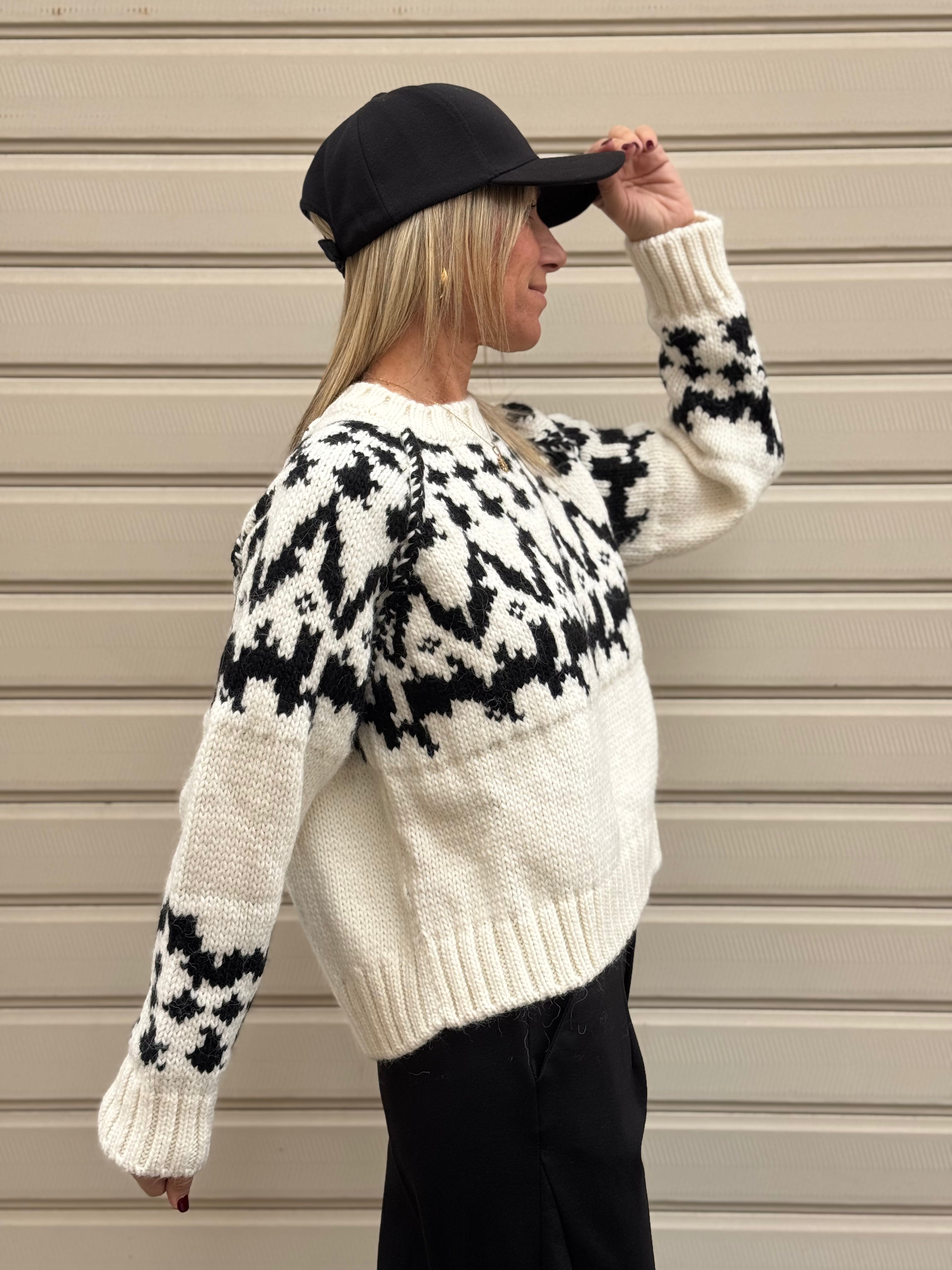 Maglione fiocco kontatto