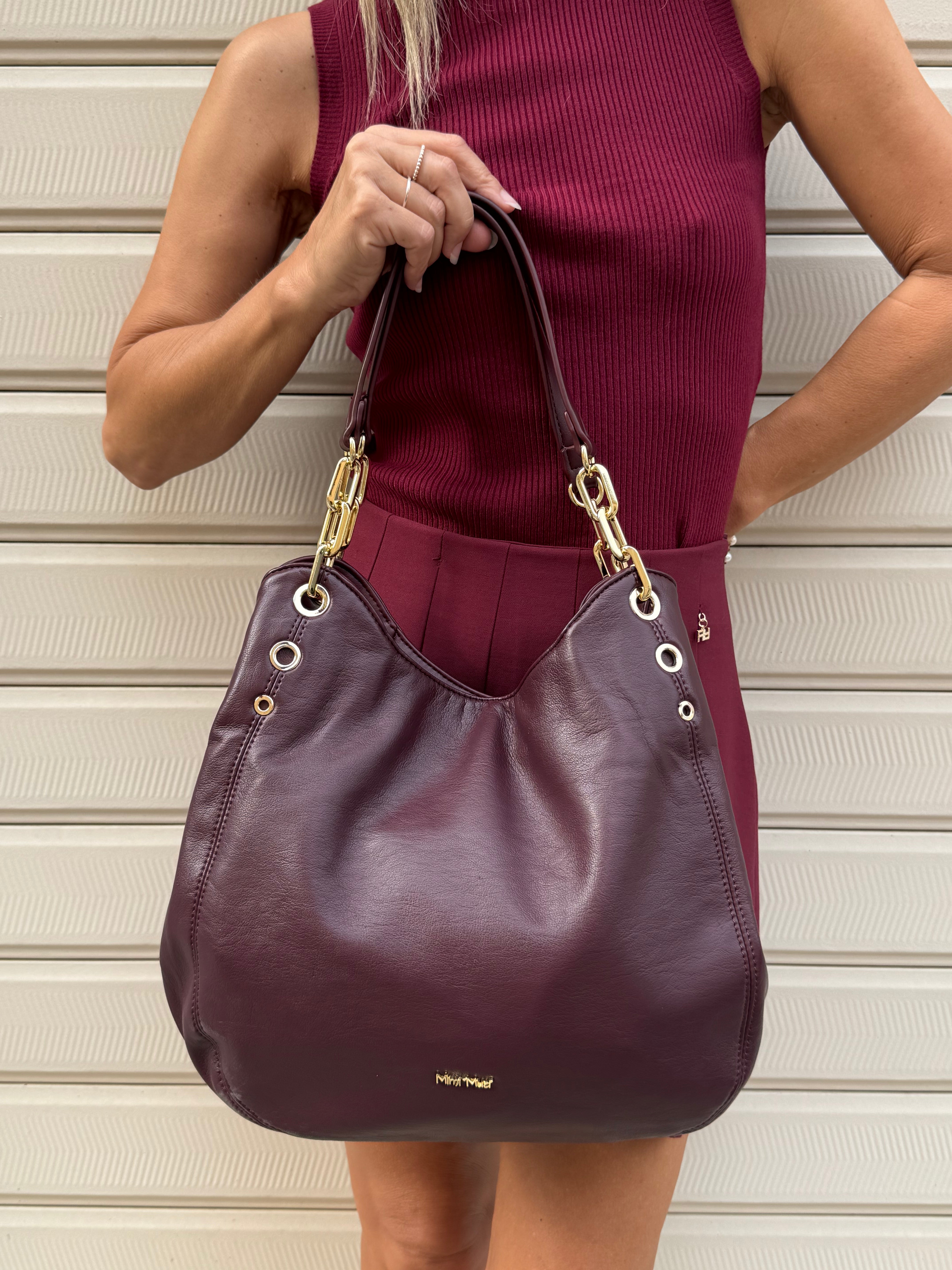Borsa morbida con occhielli