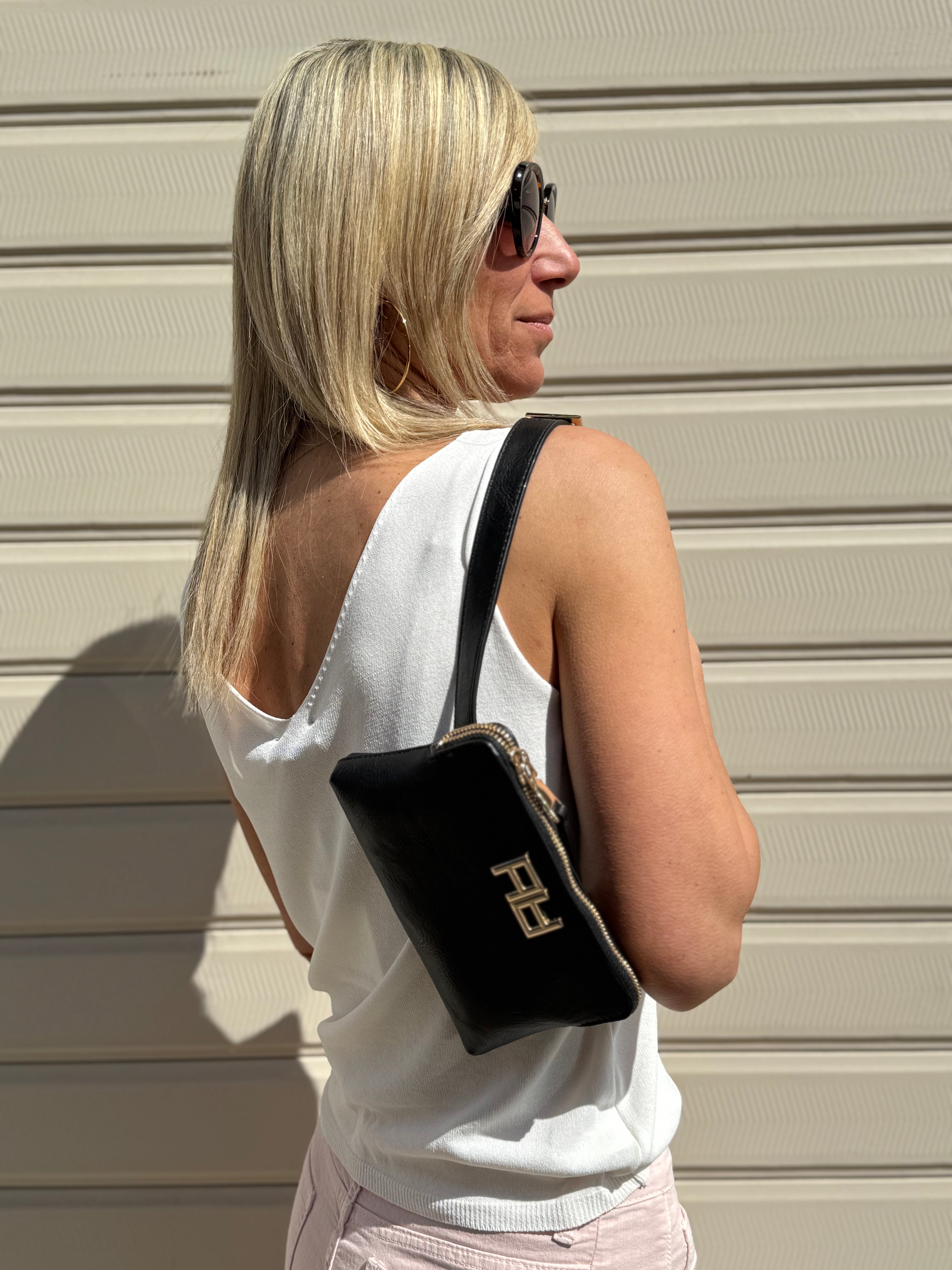 Pochette con cintura artigli