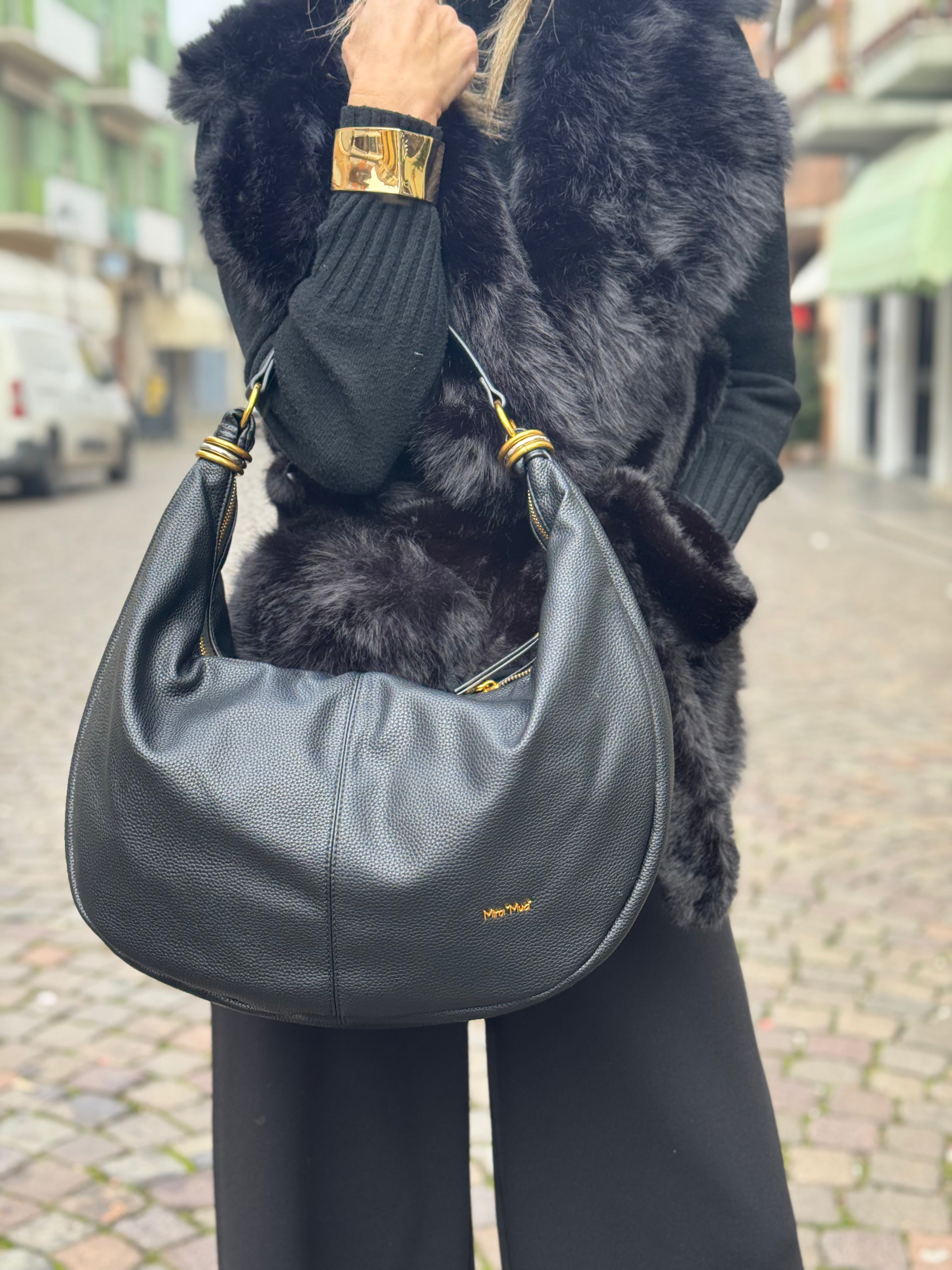 Borsa con anelli sui manici